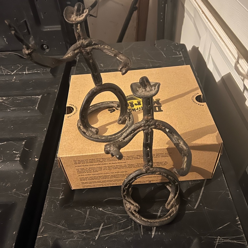 Horse shoe cowboy art sculpture. Set of two